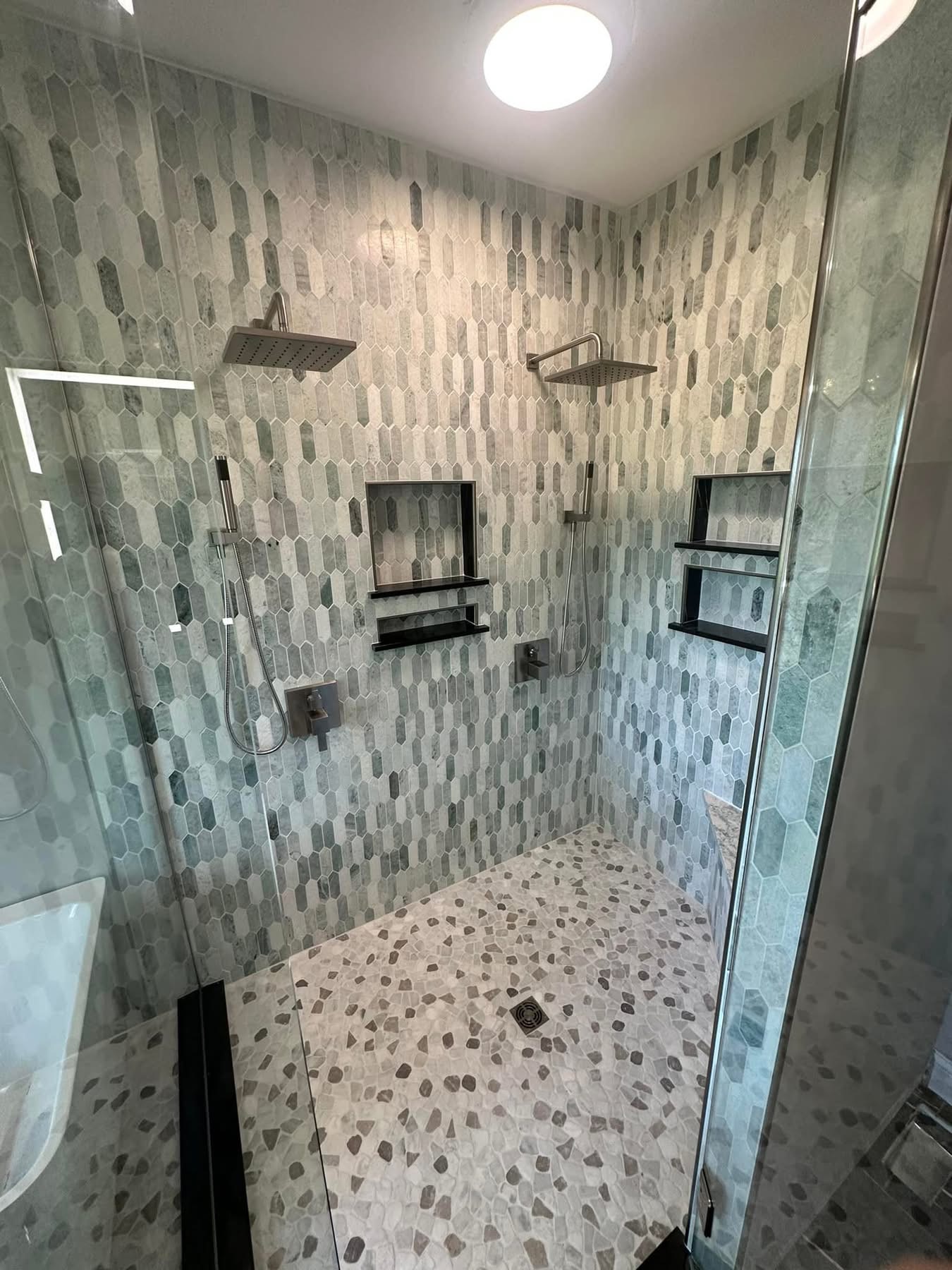 Custom tile walk-in shower with dual rain heads by Stark Elite, owner-operated remodeling in Massillon, Ohio