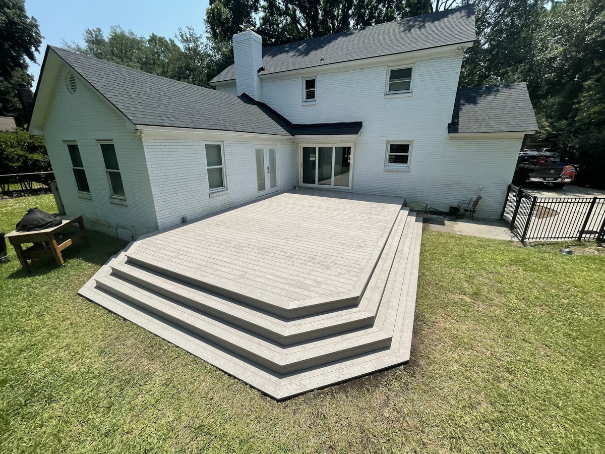 Custom composite multi-tier deck in Northeast Ohio backyard